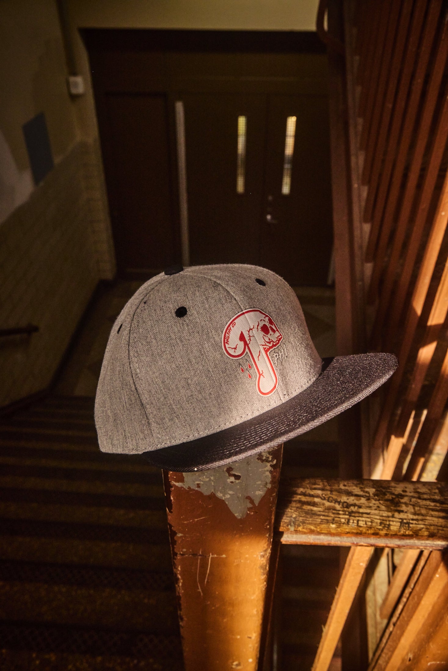 Philadelphia Phillies baseball black and grey two toned snapback hat with skull Phillies P Logo in red and white, printed snapback hat